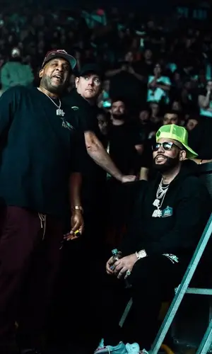 DJ Drama’s Outfit in Rhude Hoodie, Nike Sneakers & Tom Ford Eyewear (2023)
