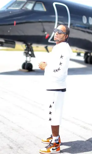 Ludacris wearing Golden Goose shorts