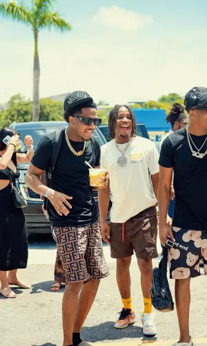 ThatBoyFunny wearing Fendi shorts