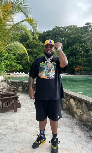Maxo Kream wearing Balenciaga t-shirt