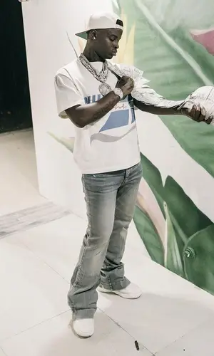 Lil Double 0’s Outfit in Rhude T-Shirt & Amiri Jeans (2023)