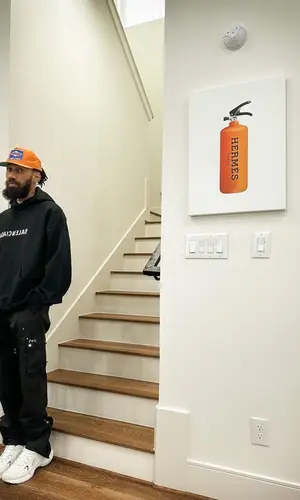 Phyno wearing Rhude hat