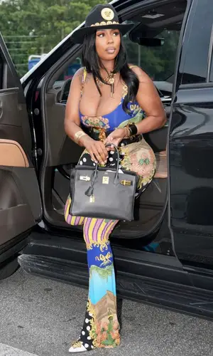 Kash Doll’s Outfit in Hermes Bag & Versace Hat (2023)