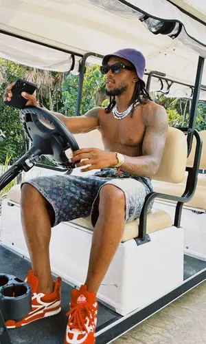 Renato Sanches wearing Louis Vuitton shorts