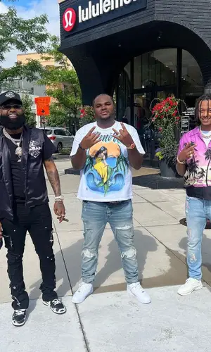 Tee Grizzley wearing Amiri t-shirt