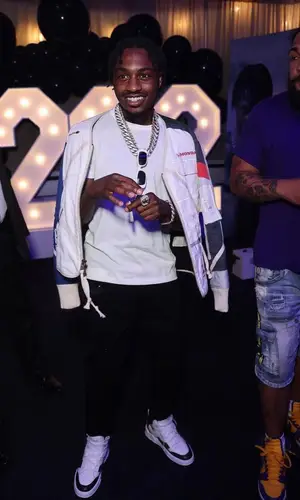 Lil Tjay wearing Prada other
