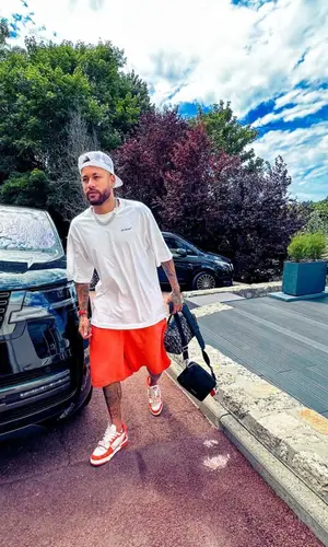 Neymar wearing Dior bag
