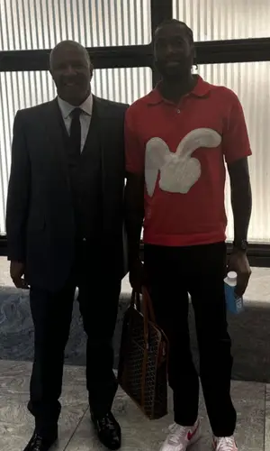 Meek Mill wearing Goyard bag