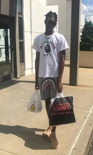 Sraedon wearing Adidas sneakers