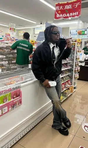 Kai Cenat wearing Balenciaga boots
