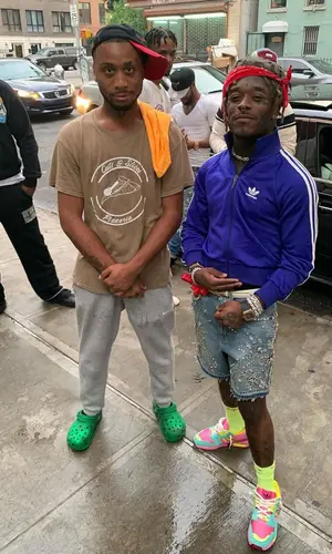 Lil Uzi Vert wearing Gucci shorts
