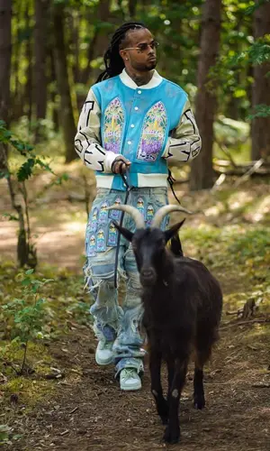 Kalash wearing Who Decides War jacket