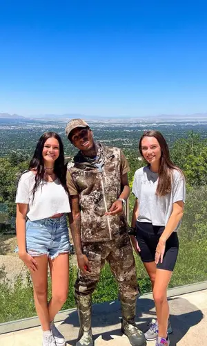 NBA YoungBoy wearing Cabela's boots