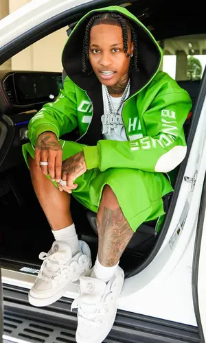 Lil Perfect wearing Nwyolise jacket
