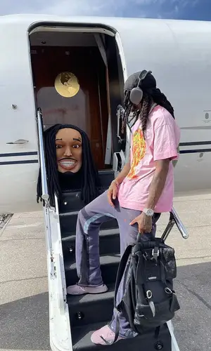 Quavo wearing Oakley sandal