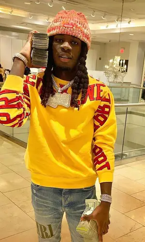 SleazyWorld Go wearing Supreme hat