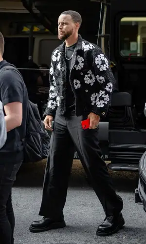 Stephen Curry’s Outfit in Readymade Jacket, Valentino Trousers & Denim Tears (2023)