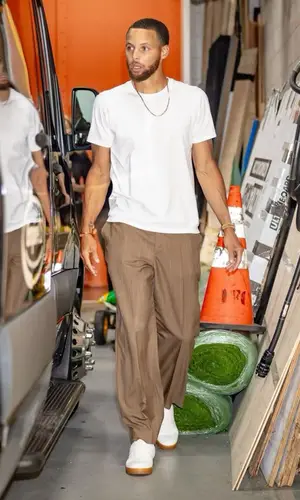 Stephen Curry’s Outfit in The Row T-Shirt, Second/Layer Trousers & Celine Sneakers (2023)
