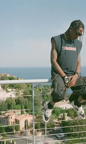 Travis Scott wearing Bottega Veneta eyewear