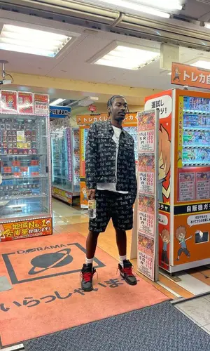 Bruce Ray wearing Supreme shorts