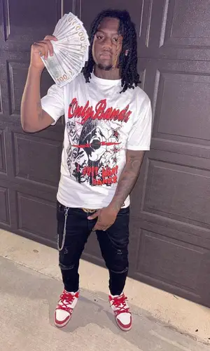 23Kayb wearing Only Banz t-shirt