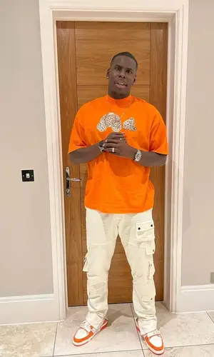 Kurt Zouma wearing Louis Vuitton sneakers