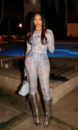 Jodie Woods’ Outfit in Diesel T-Shirt, Givenchy Boots & Louis Vuitton Bag (2023)