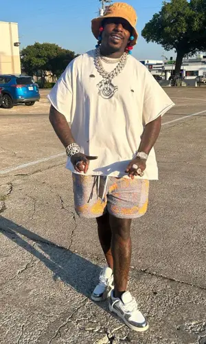 Sauce Walka wearing 2828 Studios hat