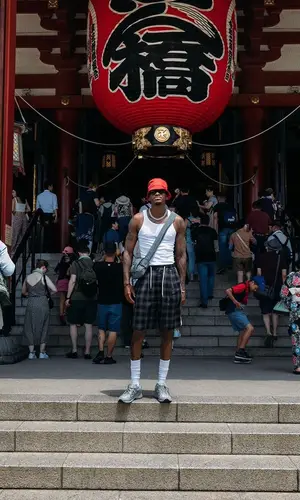Jarred Vanderbilt’s Outfit in Dior Sneakers, Bottega Veneta Bag & Prada Hat (2023)