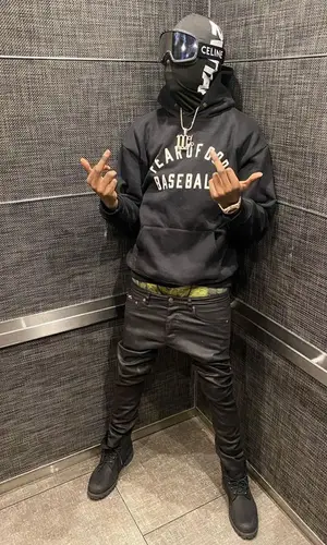 Bandmanrill wearing Amiri jeans