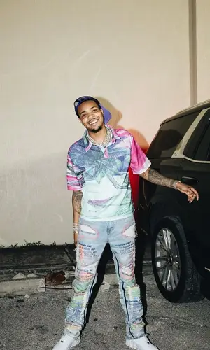 G Herbo wearing Who Decides War shirt