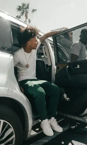 Mikey’s Outfit in Polo Ralph Lauren T-Shirt, Stone Island Pants & Nike Sneakers (2023)