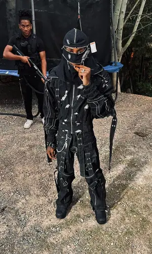 NBA YoungBoy wearing Cabela's boots