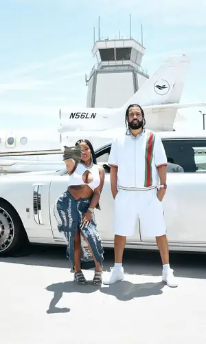French Montana wearing Gucci shirt