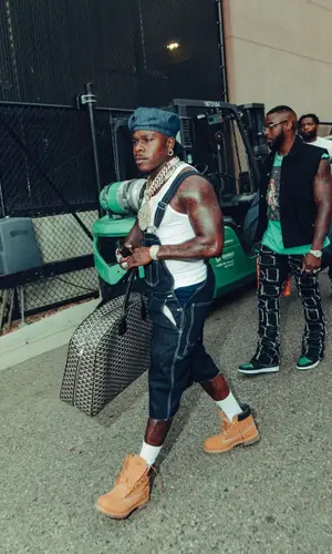DaBaby wearing Goyard bag