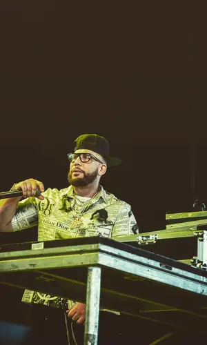 DJ Drama’s Outfit in Dior Shirt, Tom Ford Eyewear & ERL (2023)