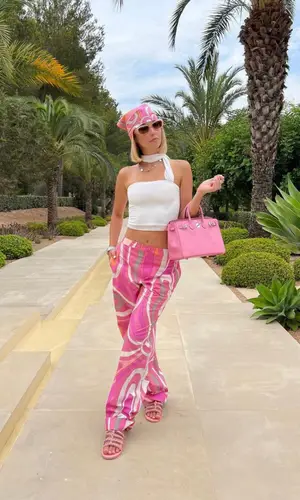 Sarah Snyder’s Outfit in Emilio Pucci Pants, Hermes Bag & Chanel Eyewear (2023)