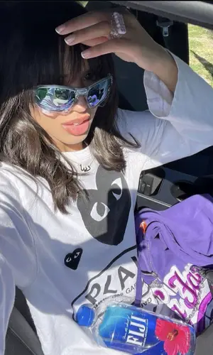 Dina Ayada wearing Prada bag