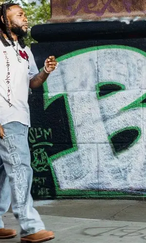 Burna Boy wearing Timberland boots