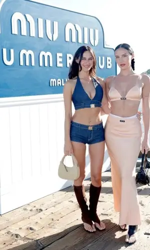 Devon Carlson wearing Miu Miu shorts