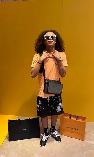 DD Osama wearing Amiri sock