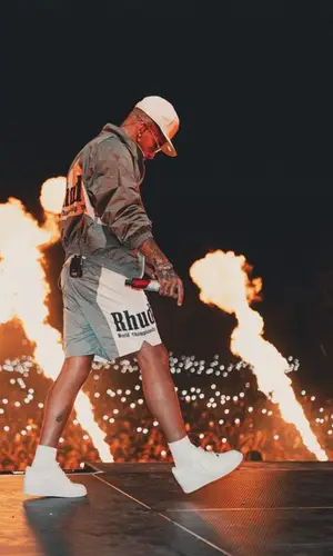 Sfera Ebbasta’s Outfit in Rhude Jacket, Nike Sneakers & New Era Cap (2023)