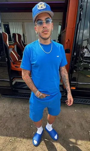 Sfera Ebbasta’s Outfit in Cartier Eyewear, New Era Cap & Marino Infantry (2023)