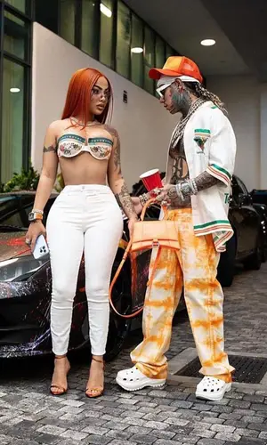 6ix9ine’s Outfit in Casablanca Shirt, Louis Vuitton Eyewear & Crocs Sandals (2023)