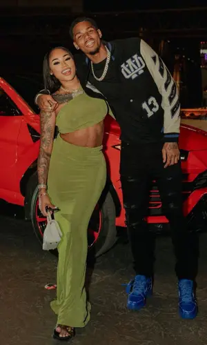 Dejounte Murray wearing Off-White jacket