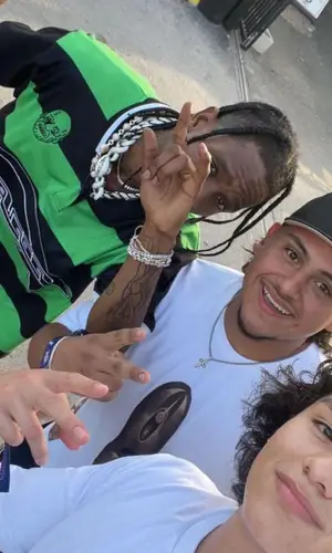 Travis Scott wearing Rick Owens shorts