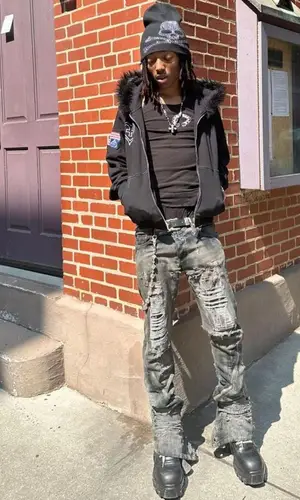 Lil Tecca wearing Chrome Hearts top