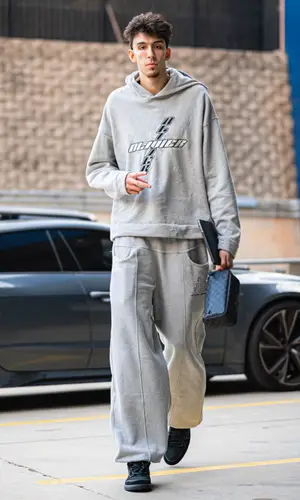 Chet Holmgren wearing Louis Vuitton bag