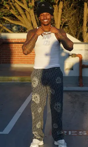 Duke Dennis wearing Dior jeans