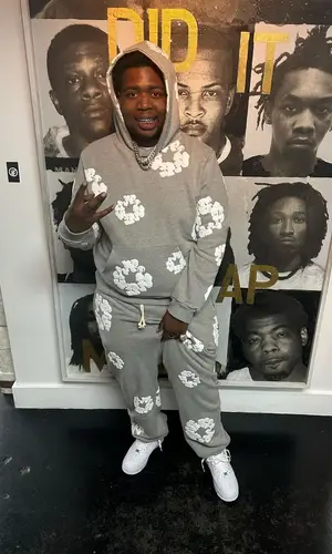 Big30 wearing Nike sneakers